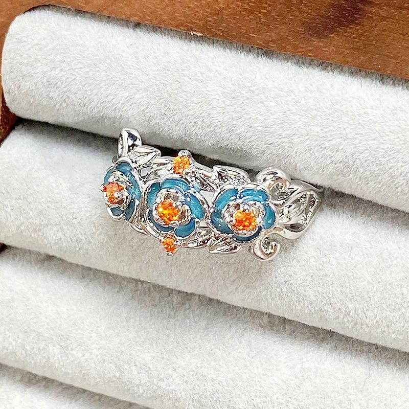 

Blue Enamel Oil Dripping Camellia Zir*****Pen Ring Small Daisy Niche Light Luxury High Sense Personality Ring Woman Adjustable opening