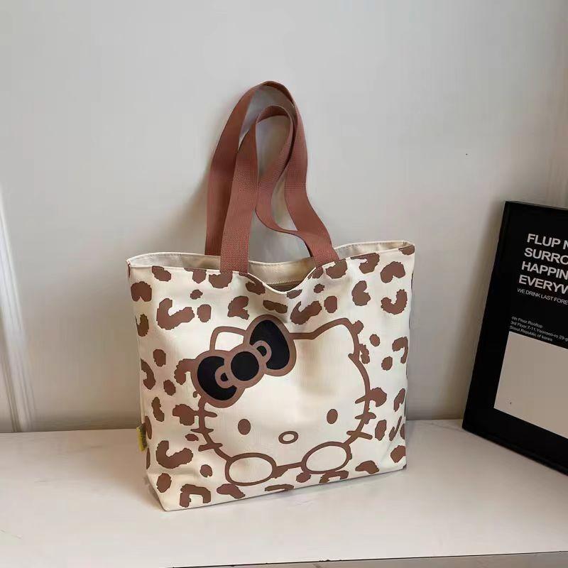 Cartoon canvas bag, women's versatile shoulder commuter tote bag, large-capacity student class handheld book gift bag