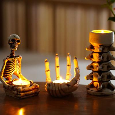 מחזיק נרות לליל כל הקדושים שרף מעמד יד נר תה גולגולת עמוד שדרה פמוט מחזיק שלד בית גותי