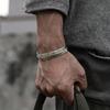 Retro-style adjustable feather bracelet - a unique rock-and-roll fashion accessory with a simple and cool design.