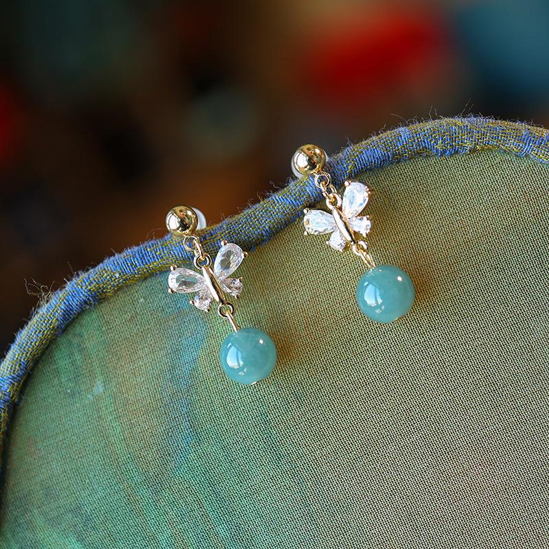 Elegant 14K Gold Butterfly Jade Bead Earrings - Cool, Luxurious, and Unique Studs in Natural Blue.