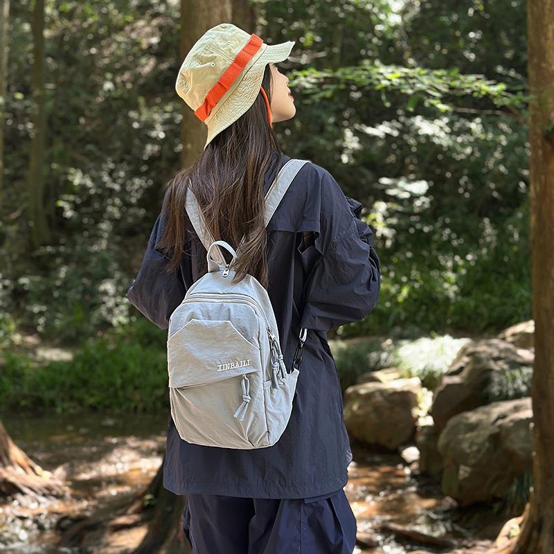 Outdoor travel small backpack backpack new fashion versatile student shoulder leisure bag oblique span breast bag