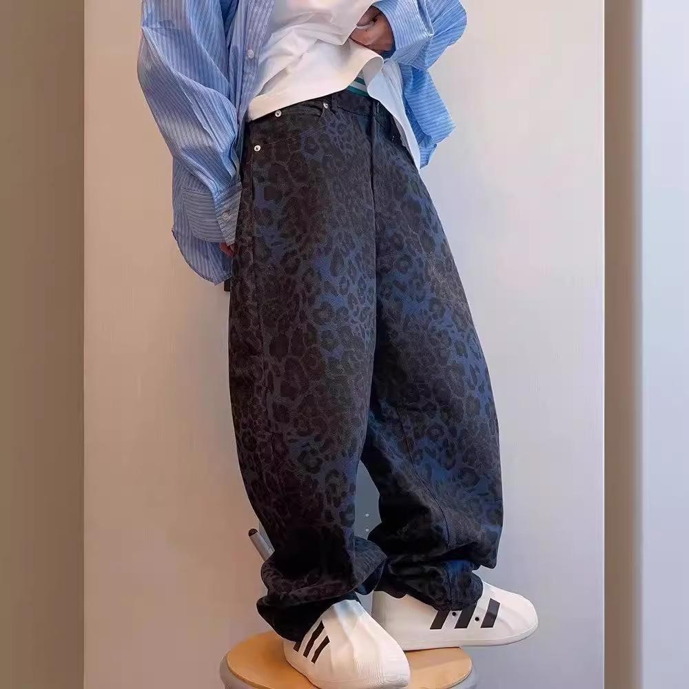 Americká vysoká pouliční móda: Pánské volné džíny s koženou výšivkou - Zimní trend, široký střih.