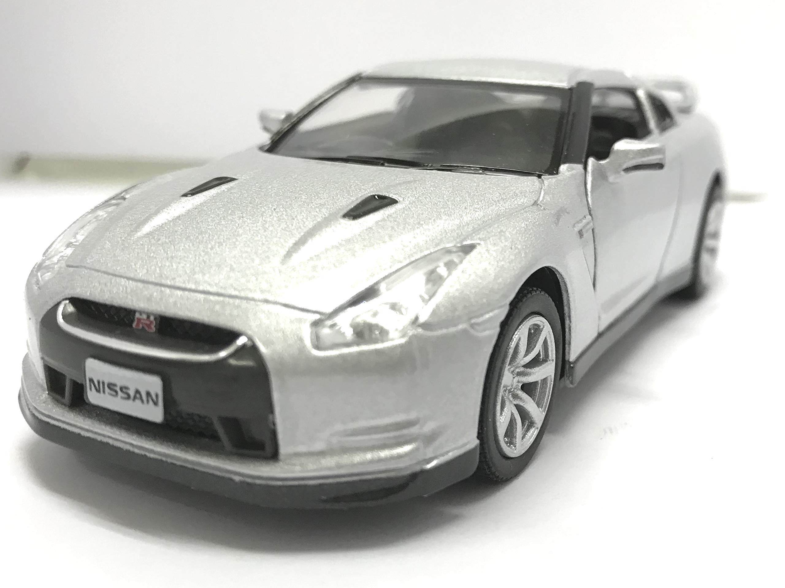 

KiNSMART 2009 Nissan R35 Инерционная мини-машинка Серебристый 1/36 GT-R серебряный