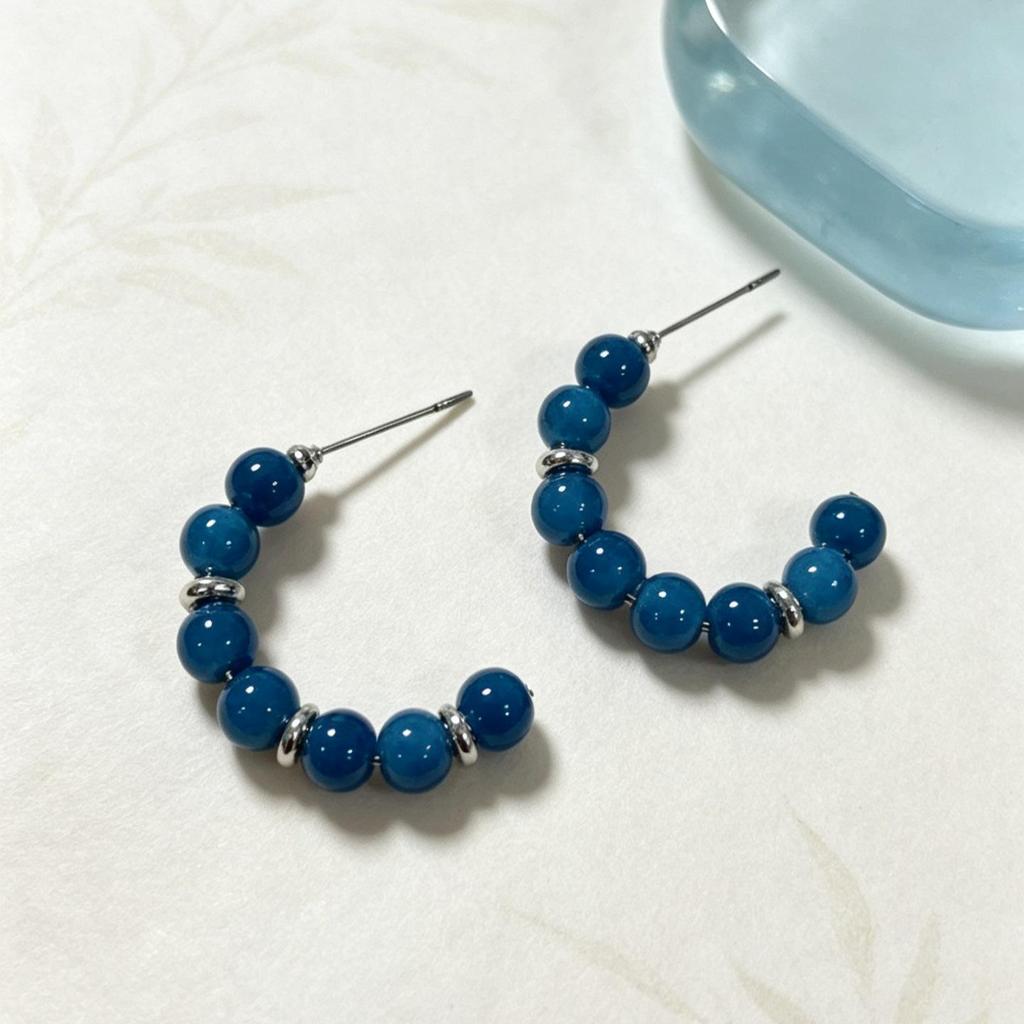 Vintage Blaue Glas-Schleifenohrringe - Retro Design Schmuckstück