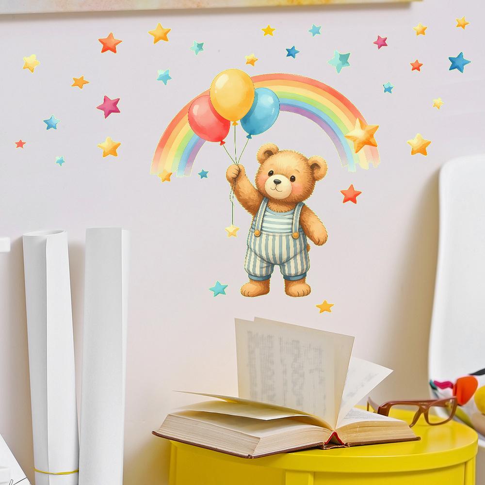 A Cartoon Bear Holding Balloons and A Rainbow-shaped Night Light Sticker for Wall Decoration in The Bedroom.