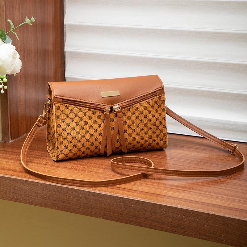 Women's bag, new women's change bag, niche bag, messenger bag, printed shoulder bag, one piece.