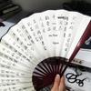 Traditional Chinese Silk Bamboo Folding Fan with Ink Landscape