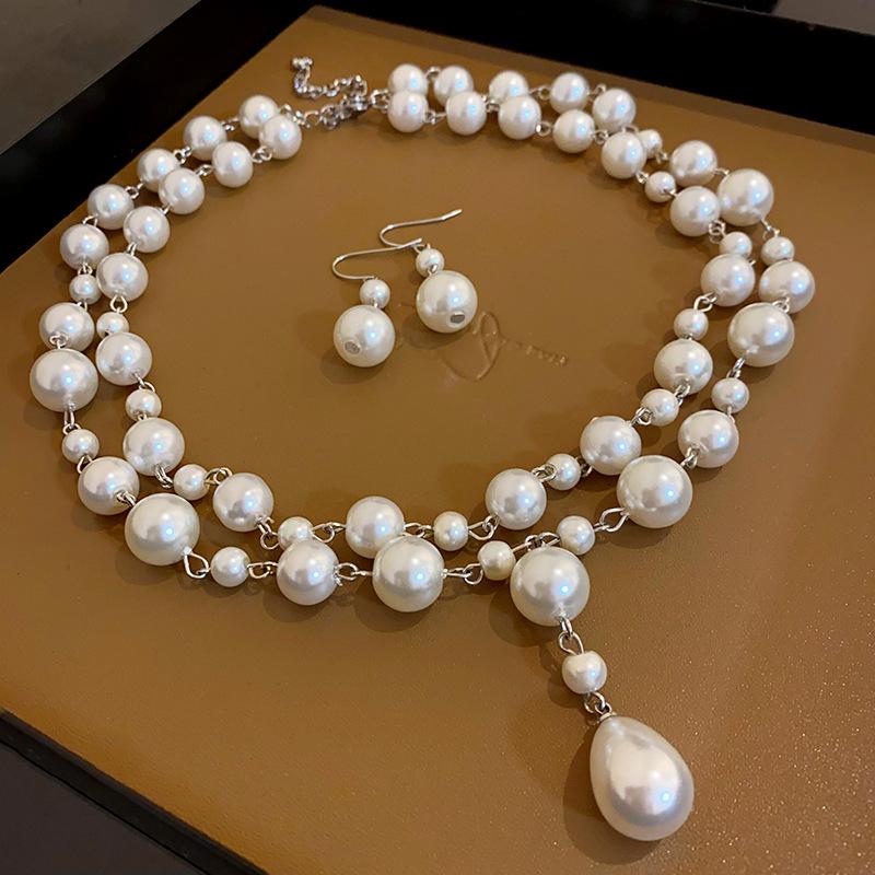 Französische mehrlagige Perlen-Schlüsselbeinkette - Luxuriöses, modisches und vielseitiges Design für Frauen