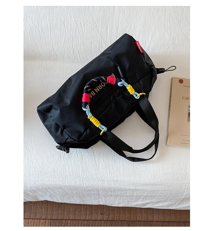 

Japanese messenger bag casual simple nylon shoulder bag lightweight outdoor sports texture rainbow rope men s and women s handbags чёрный