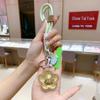 Zhou Family 999 Pure Gold Keychain Pendant - Elegant Gift for Girlfriend