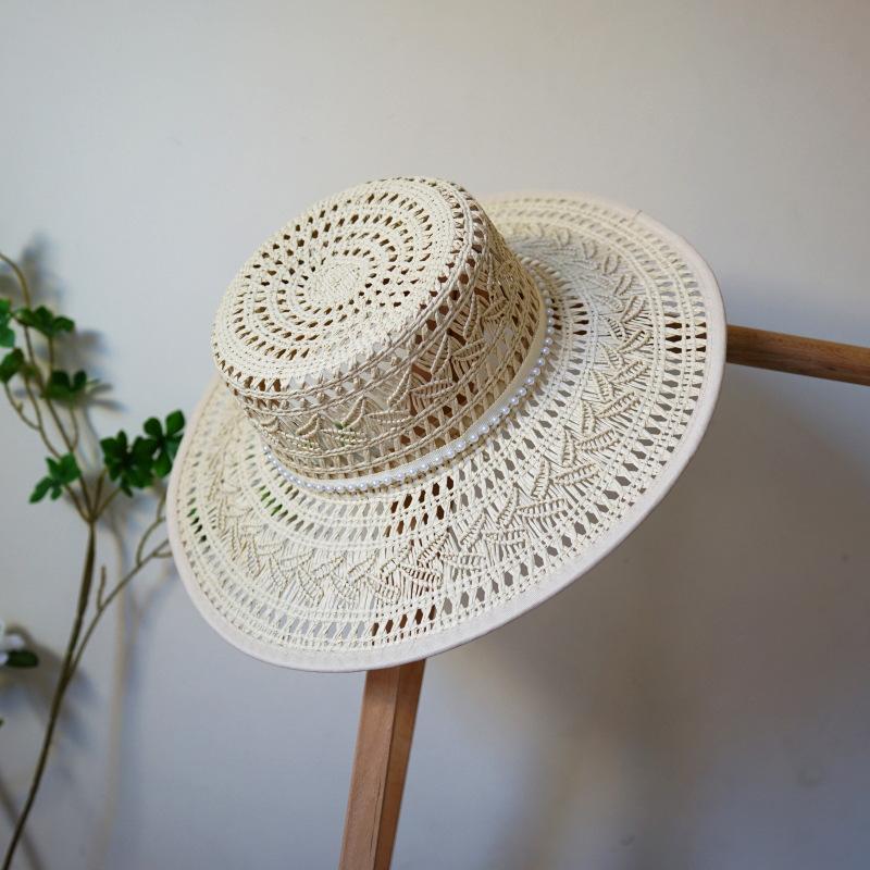 French Retro Elegant Hollow Woven Flat Top Top Hat Women'S Summer Sunshade Vacation Straw Hat Straw Hat Beach Japanese