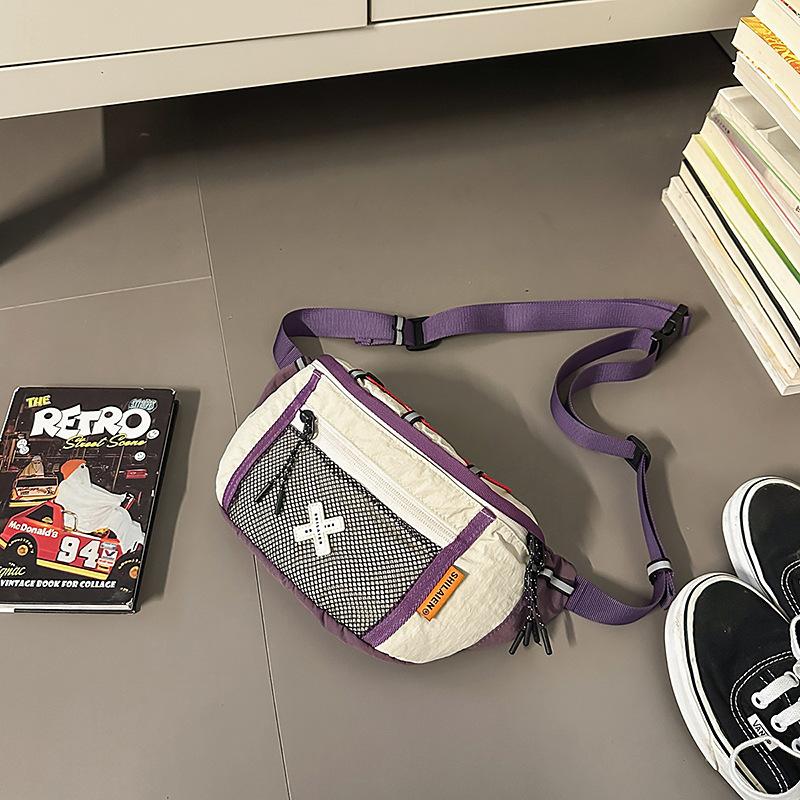 

Personality trend casual 2025 fashion foreign style shoulder bag niche design summer new women s breast bag fanny pack фиолетовый