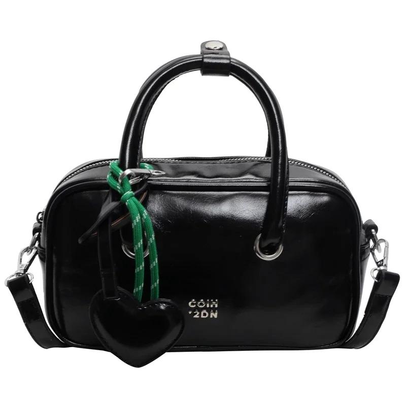 

Небольшая сумка-подушка из полиуретанового материала, стильная и универсальная, для поездок на работу, изысканная и продвинутая в европейском стиле