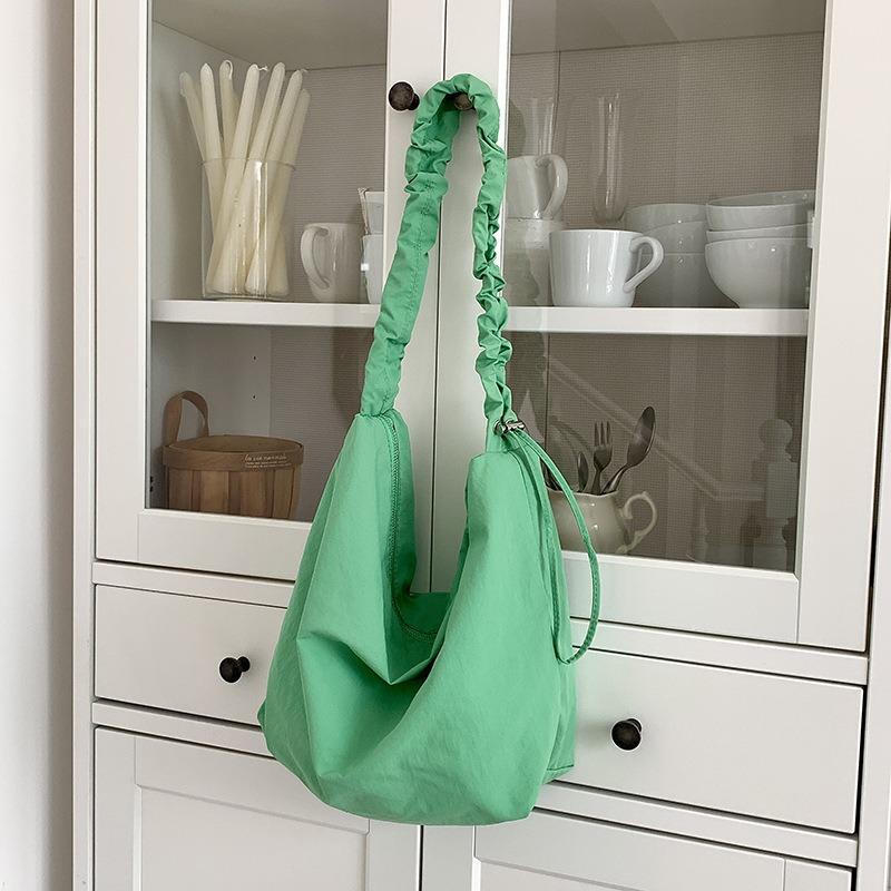 Shoulder bag women's senior sense spring and summer versatile commuter dumpling bag nylon drawstring pleated casual messenger bag women