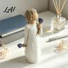 Decorative Bouquet Figurine Girl Holding Resin Figurine Faceless Lady Statue Romantic Desktop Ornament for Flower Statue Living Room Bedroom