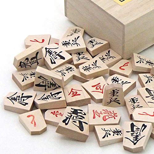 A Cute Igo Lab Original P-made Netsuke Set with a Shinkei No. 5 Folding Shogi Board and Igo Lab's Most Popular Wooden Shogi Pieces.