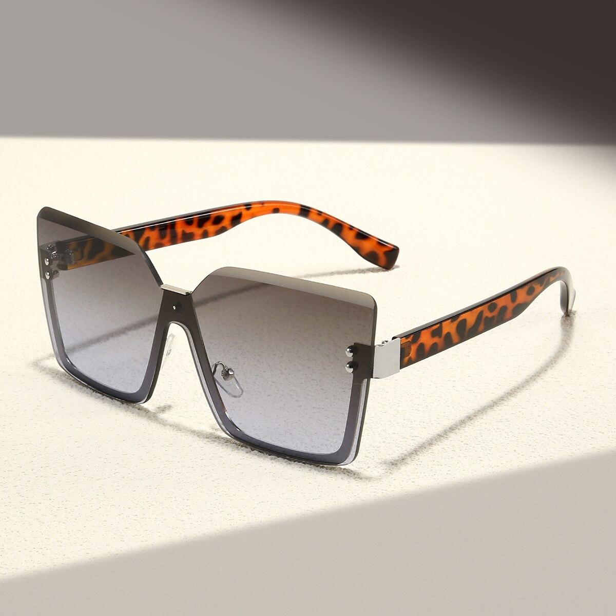 

New Large Frame Frameless Gradient Women Fashionable Sunglasses