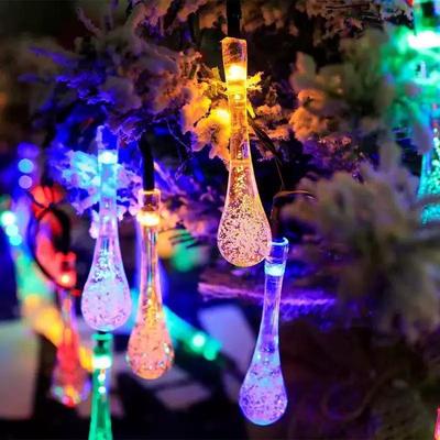 Solar LED Water Drop String Lights: Colorful, Moisture-Proof Decorative Lighting for Festivals, Hotels, and Courtyards with Ground Plug Feature.