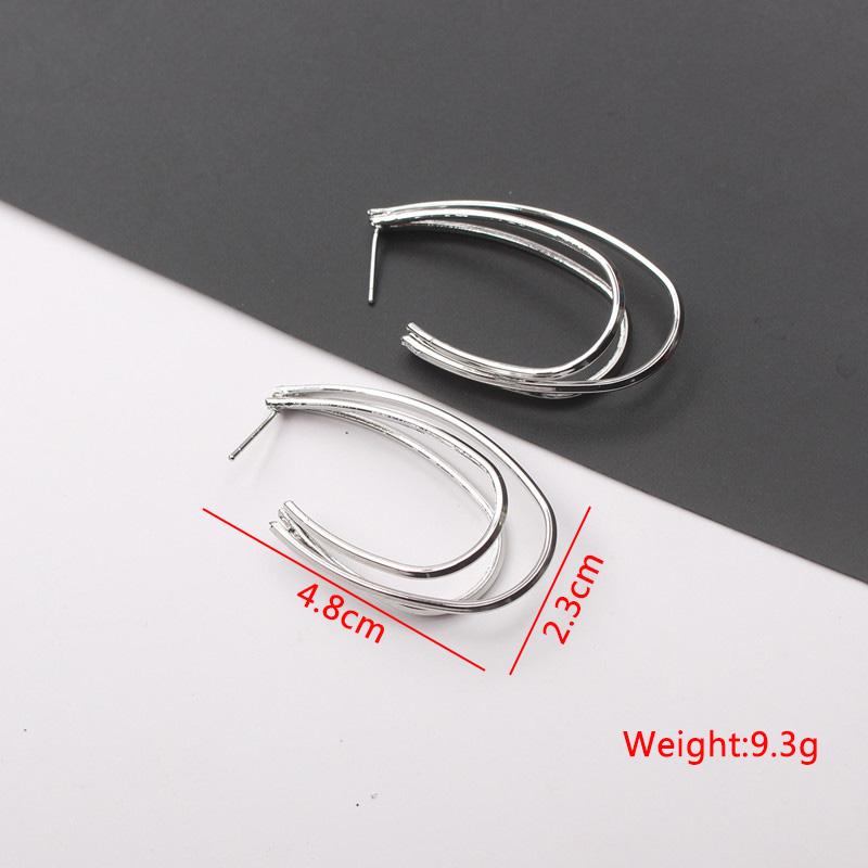 New Exaggerated Twist Metal Dangle Earrings for Women Gold Color Punk Fashion Female Hanging Earrings Boho Geometry Ear Zircon