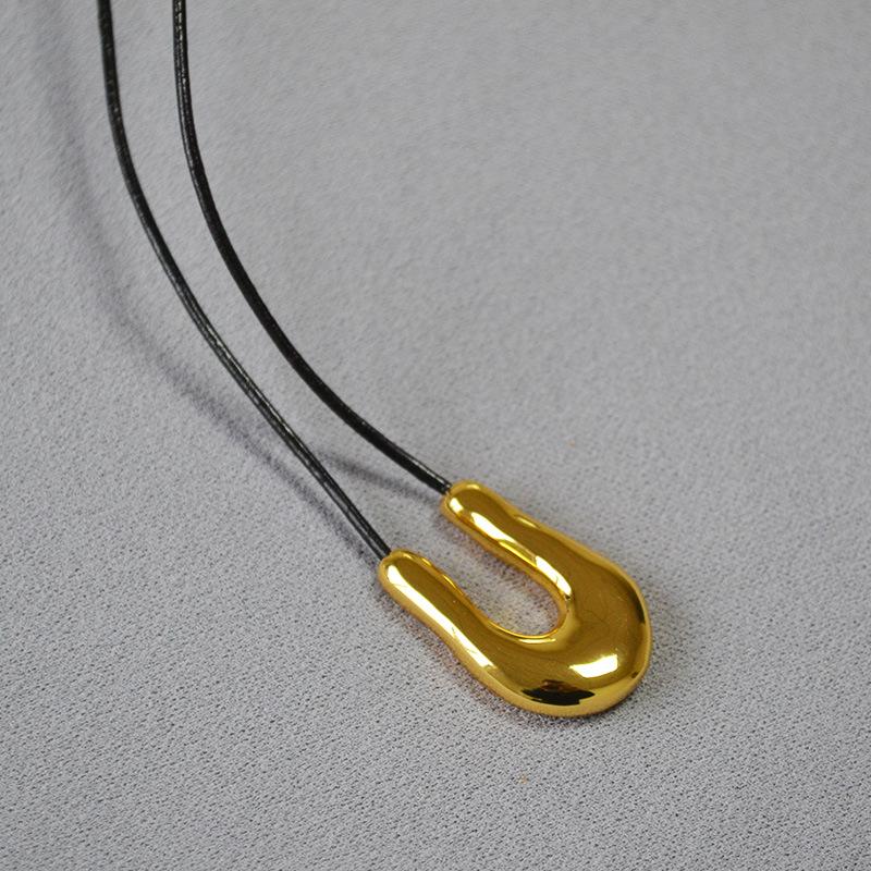 

Модное японское ожерелье-подкова U-образной формы из черной кожи золотой