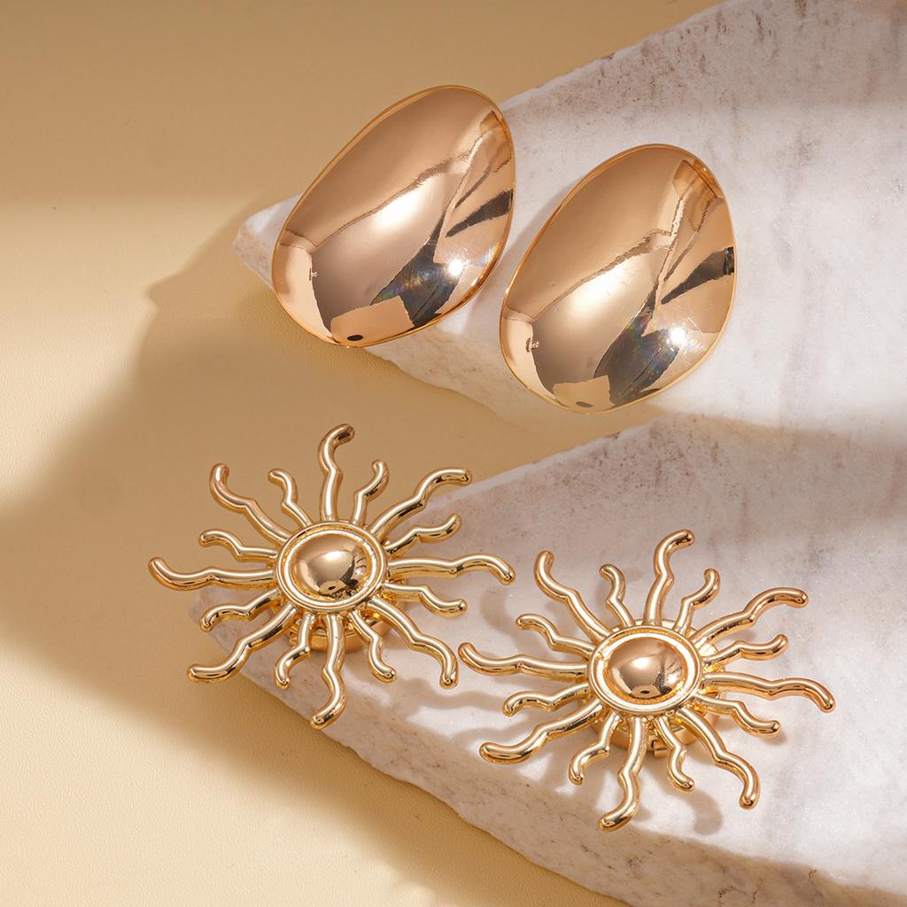 Vierteiliges Set Europäische und Amerikanische Metall Sonnenblumen Brosche Manschettenknöpfe Einfache Nischen Kleidung Accessoires