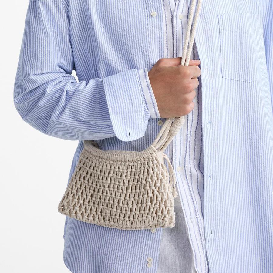 Handhold Weaving Straw Woven Handbag Elegant Handmade Woman Wrist Pack Korean Style Solid Color Woven Beach Bag Vacation