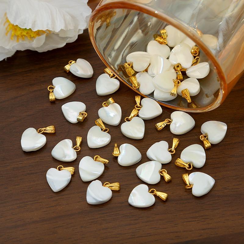 DIY jewelry accessories, hot-selling new accessories, horseshoe snail heart pendant, bracelet necklace.