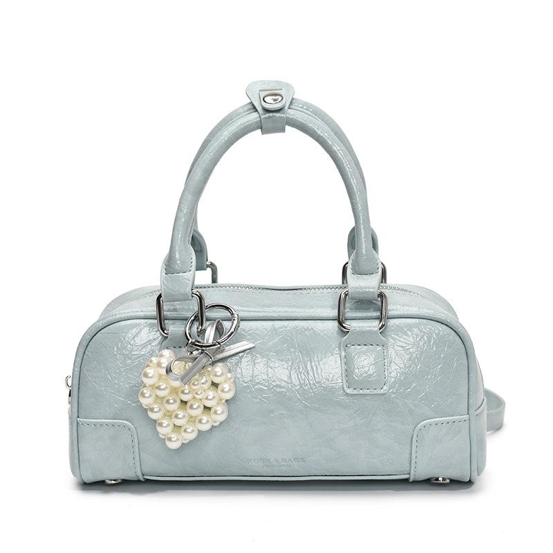 Korean niche simple portable bowling bag women 2025 new versatile foreign style fashion messenger pillow bag