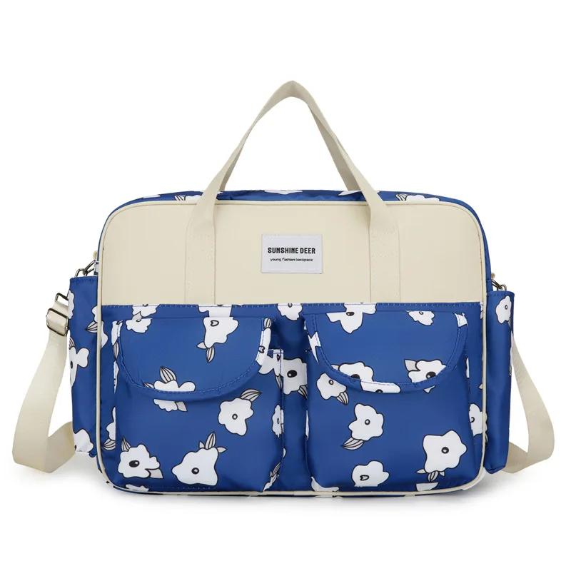 

Новий стиль Водонепроникна сумка для підгузників Дорожня сумка великої місткості Багатофункціональна сумка для вагітних і матері Дитяча коляска