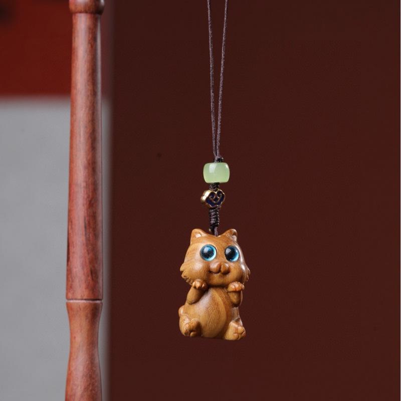 Twelve Zodiac Animal Charms Green Sandalwood Set: Rat, Ox, Tiger, Rabbit, Dragon, Snake, Horse, Sheep, Monkey, Rooster, Dog, Pig.