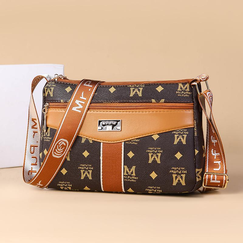 Middle-aged and Elderly Mother Buying A Large-capacity Multi-functional Shoulder Crossbody Bag In Spring