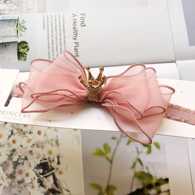 

Повязка на голову для девочки темно-розовый