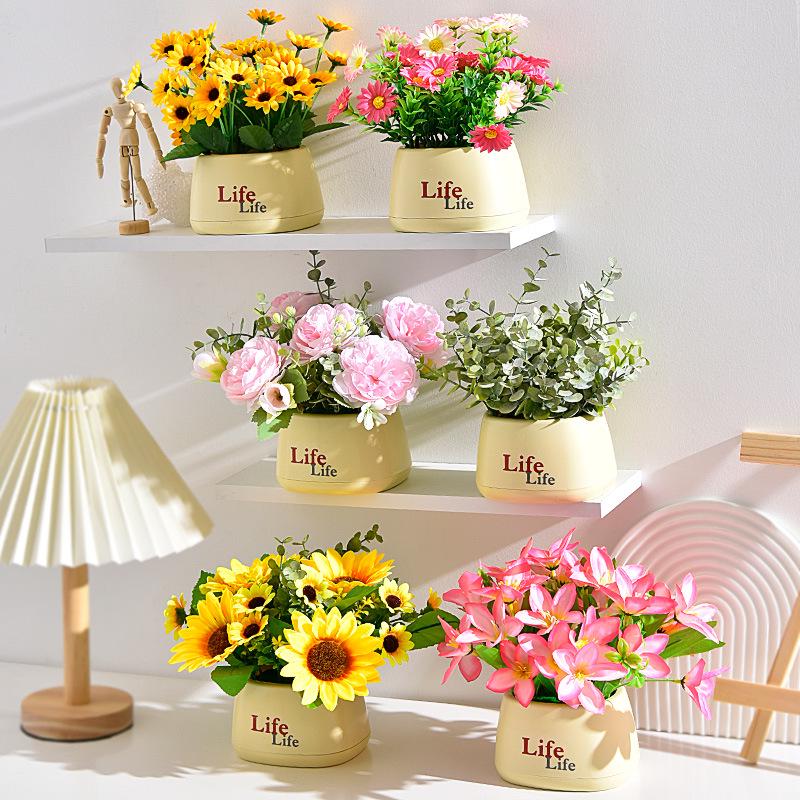 Living Room Decor: Artificial Sunflower and Green Plant Arrangements, Small Potted Plants, and Plastic Bouquets
