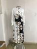 Elegant Plus Size Long Sleeve Printed Dress with Pockets and High Waist Hem