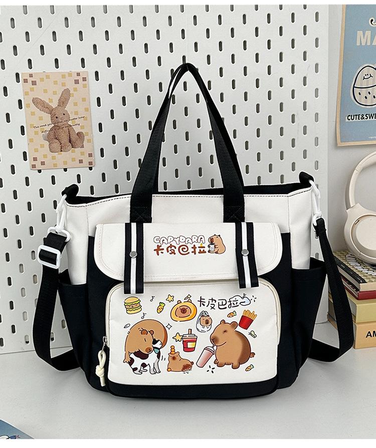 School bag 2025 new large-capacity cartoon multi-compartment high-value school bag Korean version commuting simple make-up bag lightweight backpack