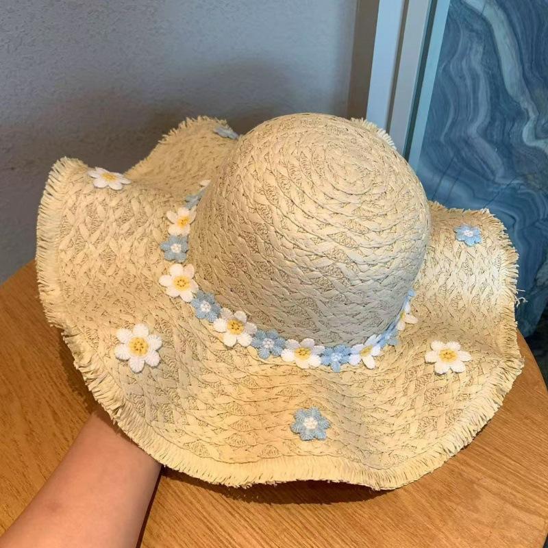 Summer seaside beach scenic spot sells small flower decorative straw hat large brim sun hat children's sun protection hat sun hat