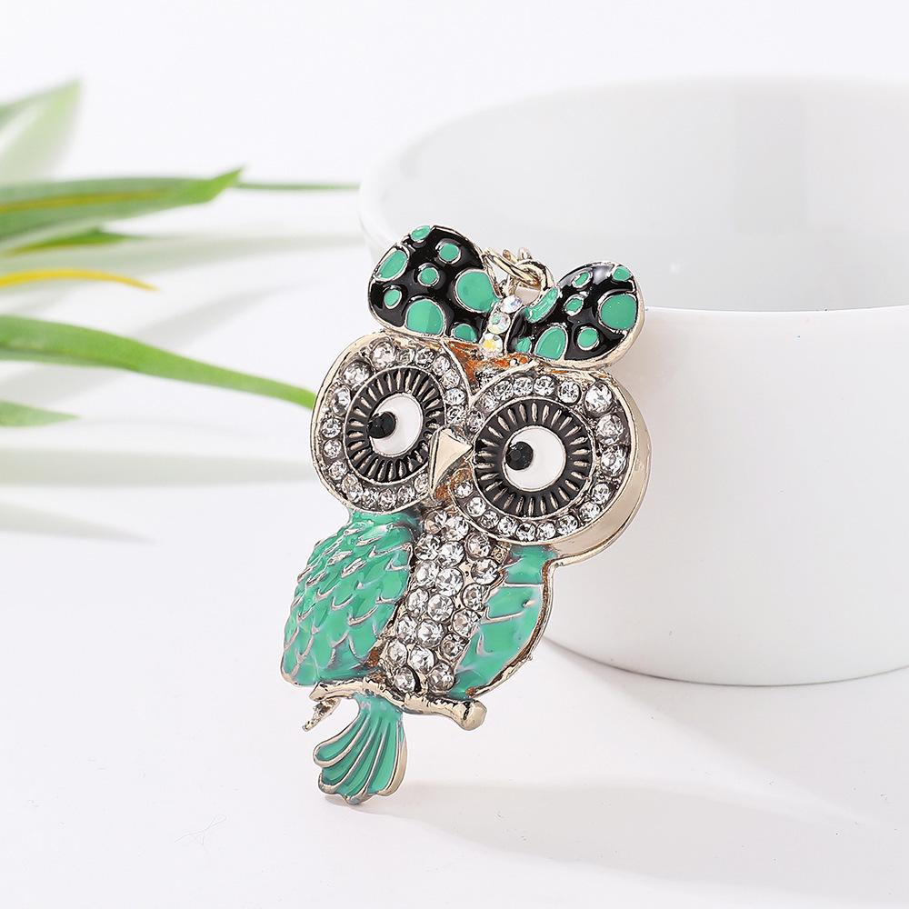 Charming Bowknot Owl Keychain: Creative Metal Pendant for Women's Bags