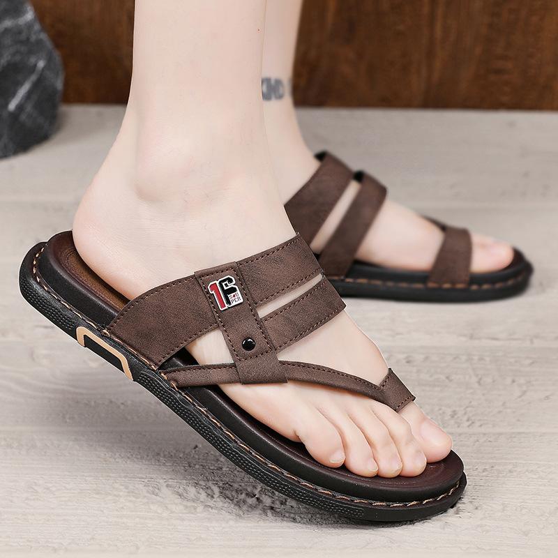 Slippers men's 2025 summer new men's Korean version of personality niche fashion non-slip outer wear driving leather cover toe drag