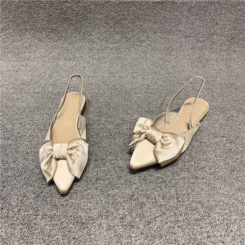 

European station women s shoes 2025 summer pointed head shallow mouth bow single shoes one word with foot cover flat bottom retro sandals 40 абрикосовий