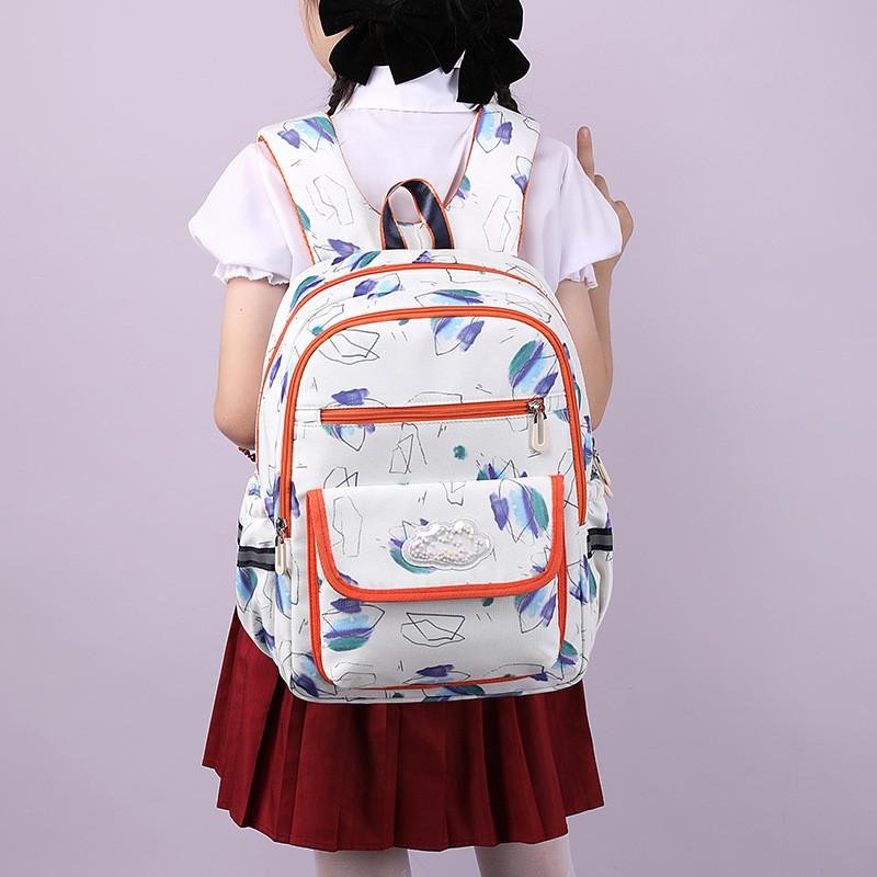 Cute And Fun Durable Nylon School Backpack For Boys And Girls With Comfortable Arm Straps And Cartoon Print