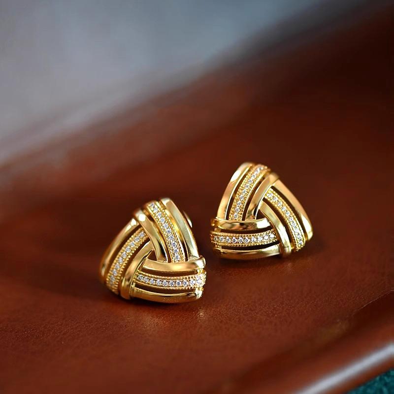 

Huitan Triangular Stud Earrings with Sparkling CZ Gold Color Geometric Knot Ear Stud for Women Daily Party Statement Zircon Hot