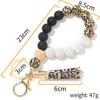 Silicone and Wooden Bead Keychain Bracelet with PU Tassel