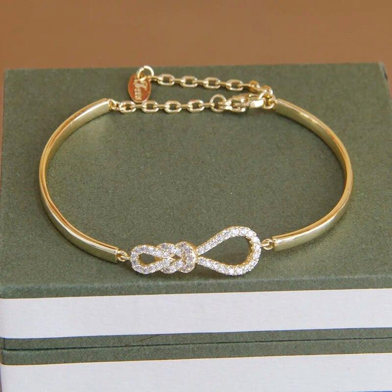 Korea&Japanese Delicate Hollow Knot Charm Bangles for Women Fashion Brand Jewelry Crystal Twist Bracelets Accessories