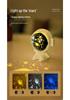 Spaceman Starry Sky Projector: Rotating Night Light & Music Lamp for Kids' Bedrooms