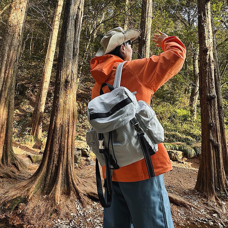 New casual sports style men's and women's backpacks, fashionable household shoulder bags, simple and lightweight backpacks