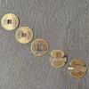 Great Five Emperors Antique Coin Charms: Copper Imitations of Liang, Wu Zhu, Kaiyuan, Song, Yuan, and Yongle Tongbao Coins.