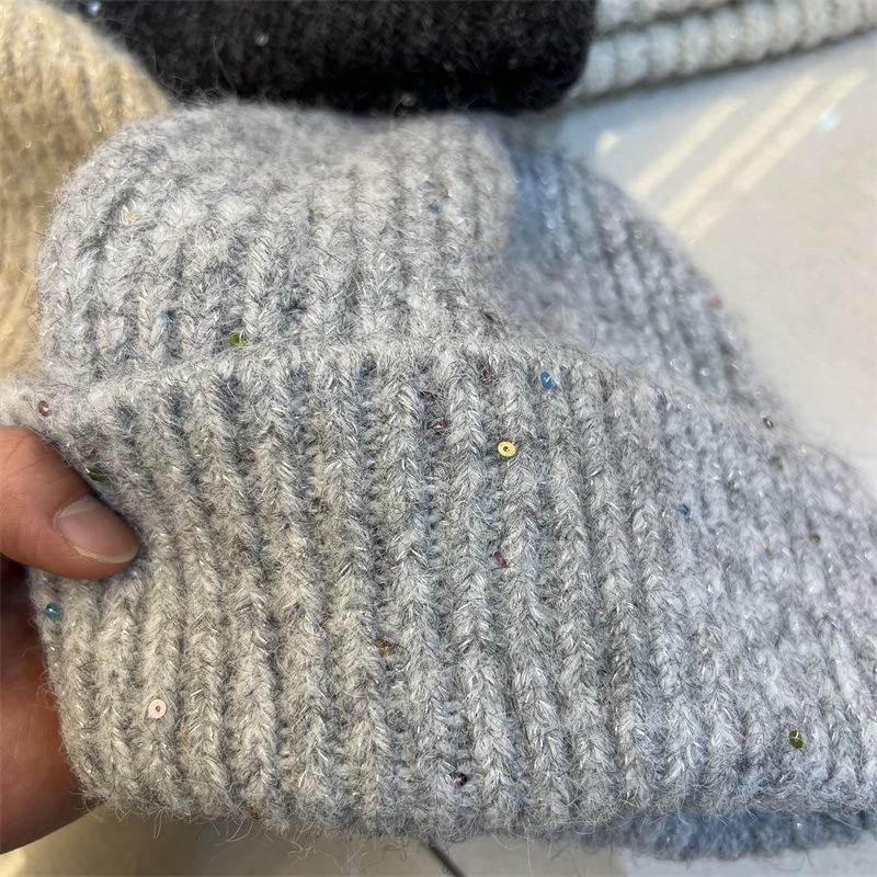 

Simple wool-blend knitted wool hat women s fashionable silver sequined ear protectors warm cold hat Average size 54-59 чорний