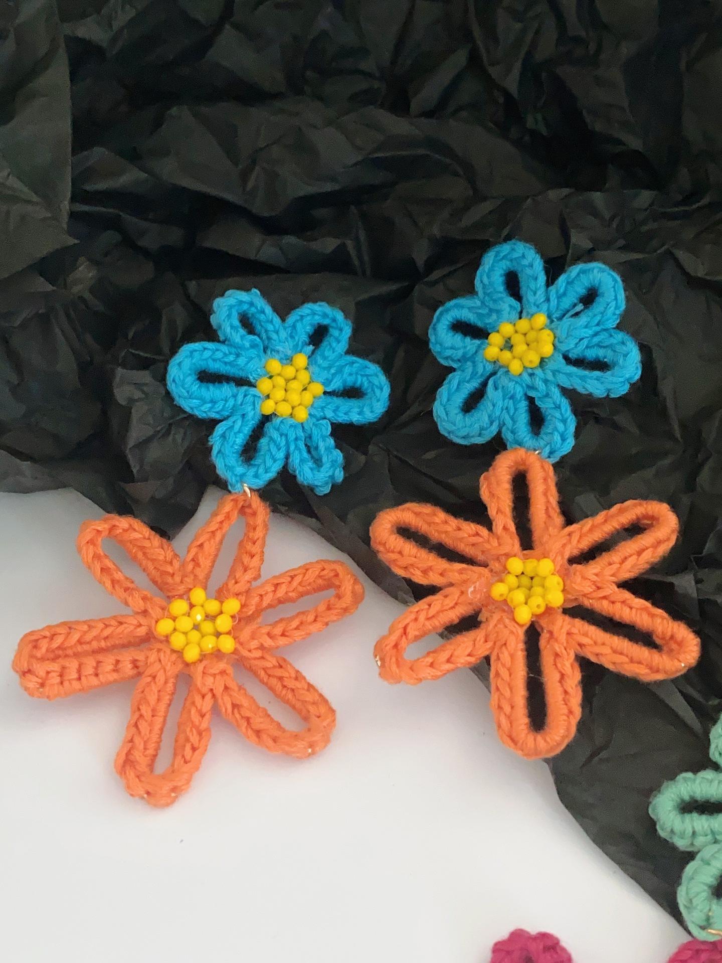 

Woven wool wound flower stud earrings exaggerated personality earrings versatile temperament earrings