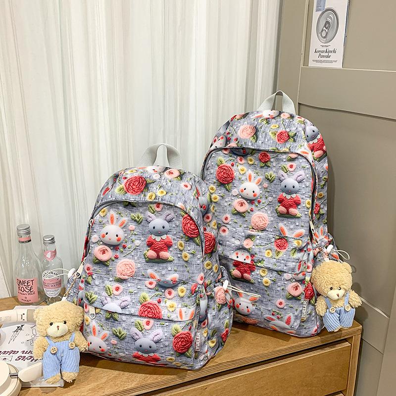 New Lightweight Student Backpacks for Both Boys and Girls  Printed Student Backpack  Female Student Spring Outing Backpack